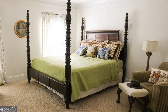 a bed room with a bed and a window