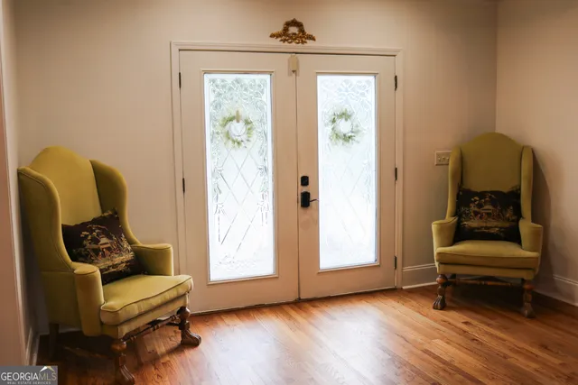 a living room with furniture and a window