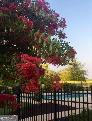 a view of pool and outdoor space