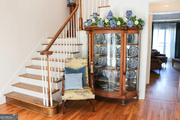 a view of entryway with wooden floor