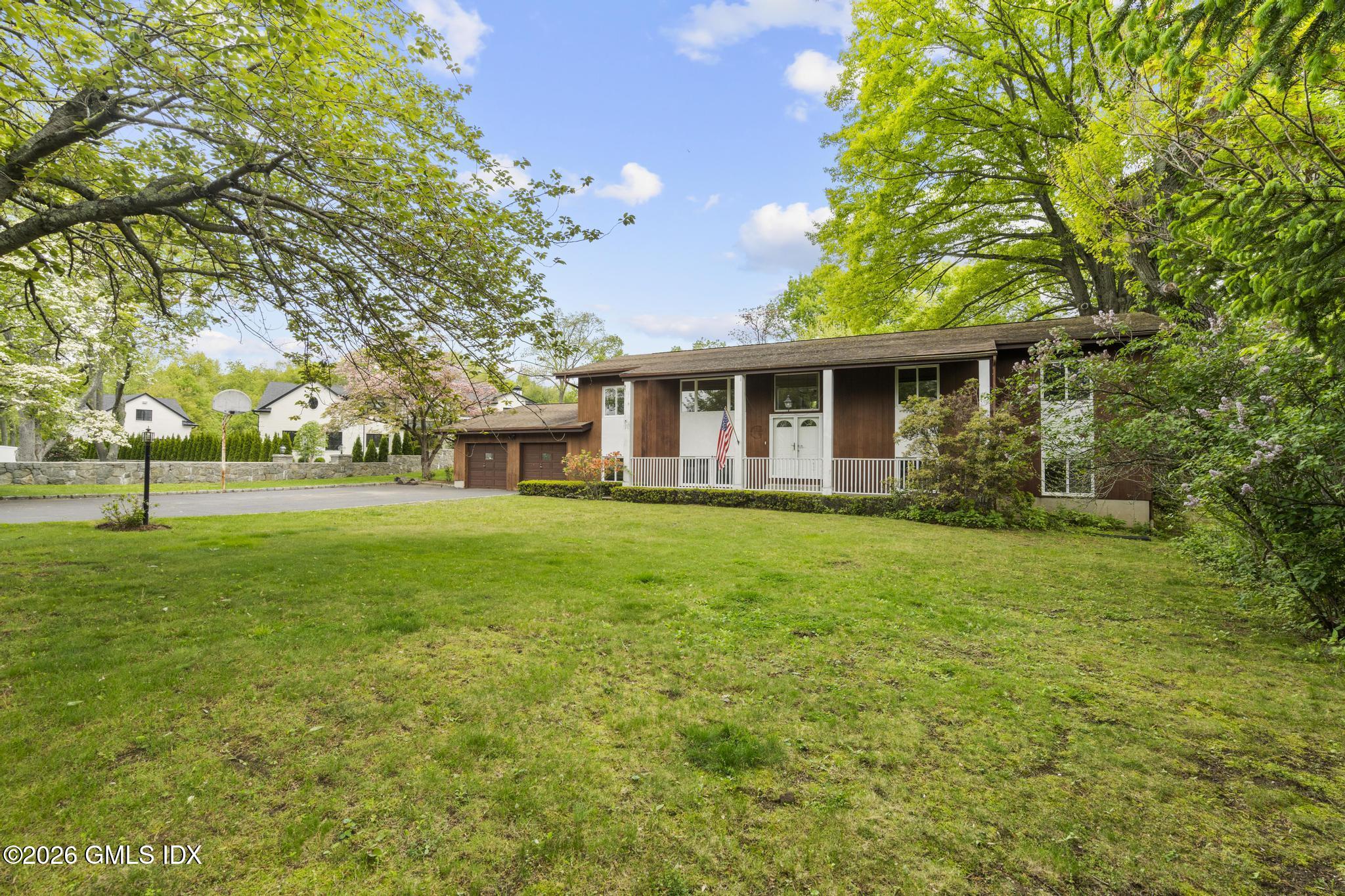 61 Angus Road North, Unit NORTH Greenwich, CT 06831 - Photo 2 of 25 Front Angle