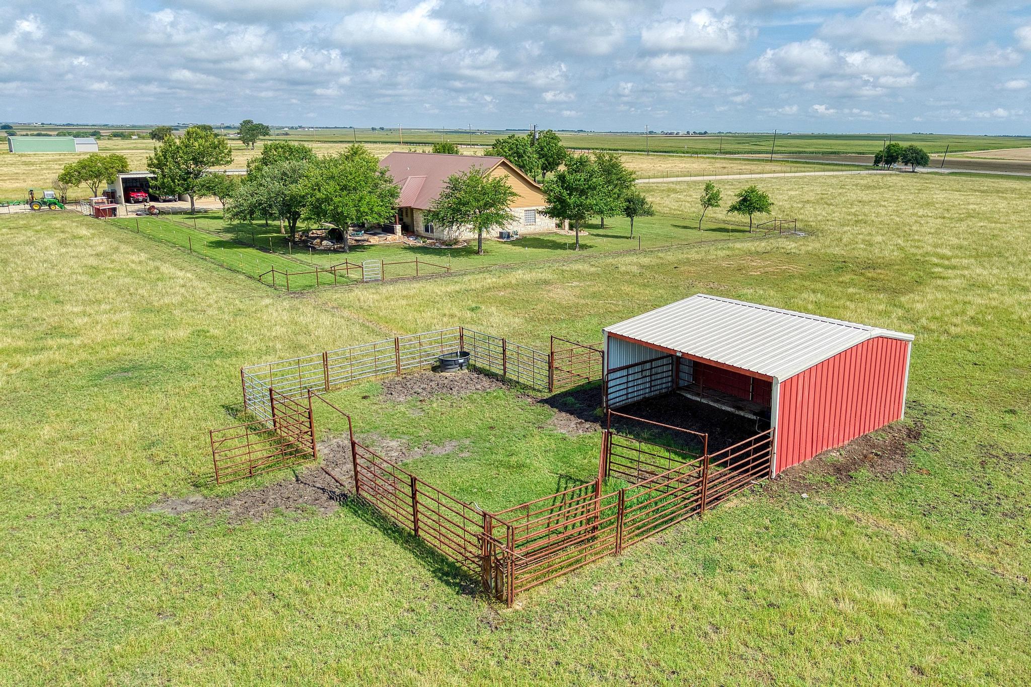 19000 Farm To Market Road 971 Granger, TX 76530 - Photo 28 of 40 The property offers a spacious loafing shed with an enclosed pen.