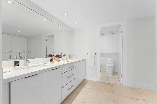 a bathroom with a shower and a toilet