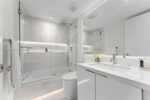 a view of a city with tall buildings