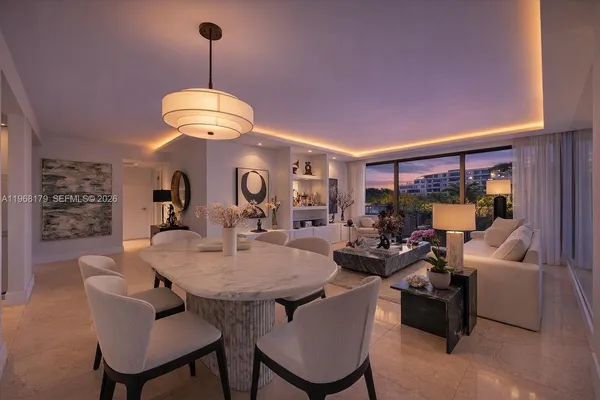 a view of a dining room with furniture window and outside view