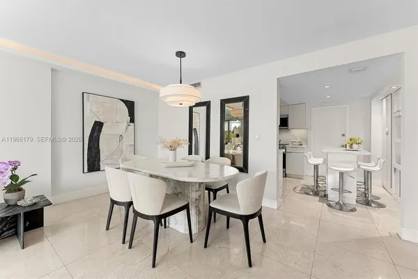 a view of a dining room with furniture