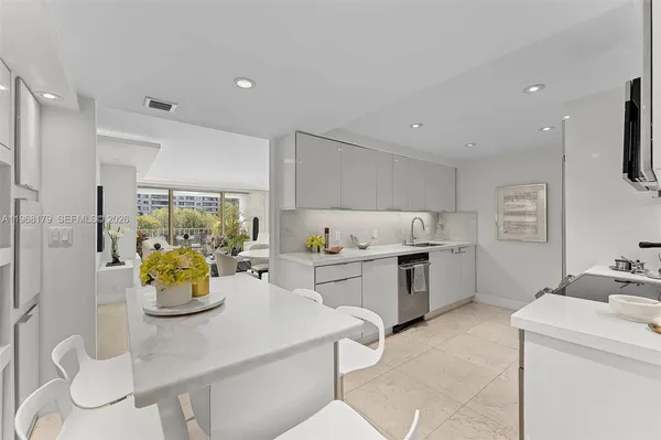 a kitchen with a sink counter top space and appliances