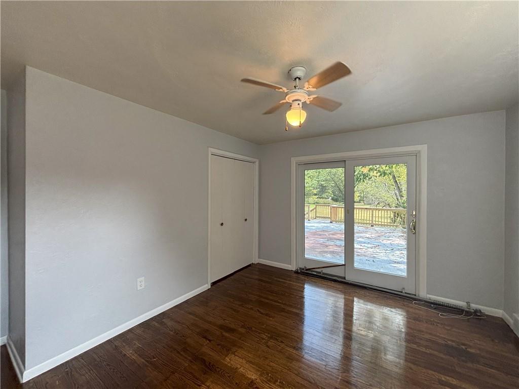 3395 Logan Ferry Road Murrysville, PA 15668 - Photo 26 of 36 a view of an empty room with window and wooden floor