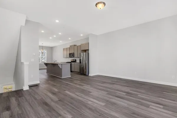 a view of kitchen with wooden floor