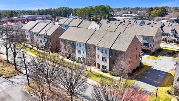 a view of city from balcony with outdoor seating
