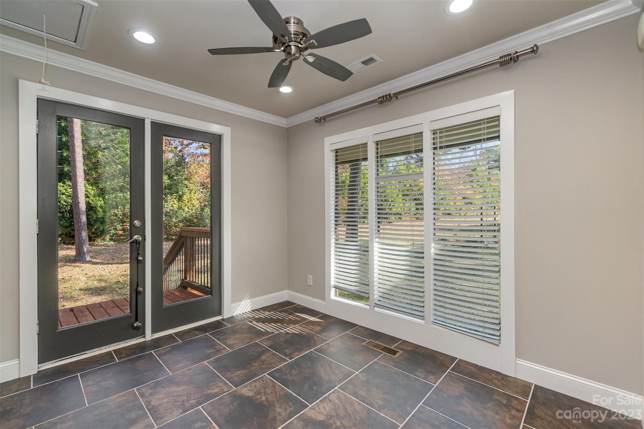 6745 Alanbrook Road Charlotte, NC 28215 - Photo 9 of 28 a view of an empty room with a window