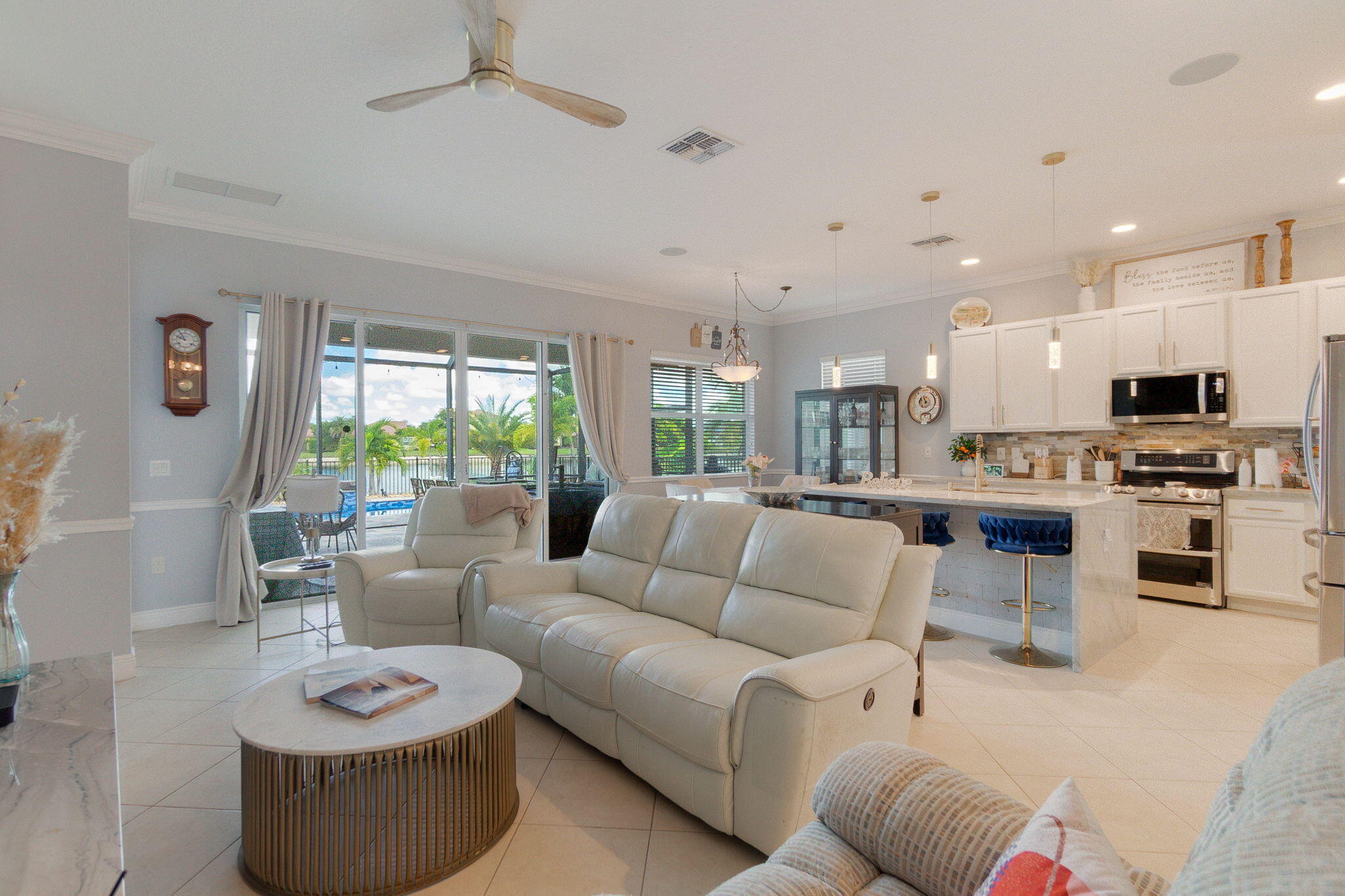 3011 Strada Court Royal Palm Beach, FL 33411 - Photo 18 of 57 a living room with furniture and a wooden floor