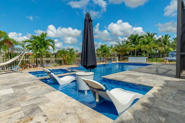 a view of a terrace with sitting area