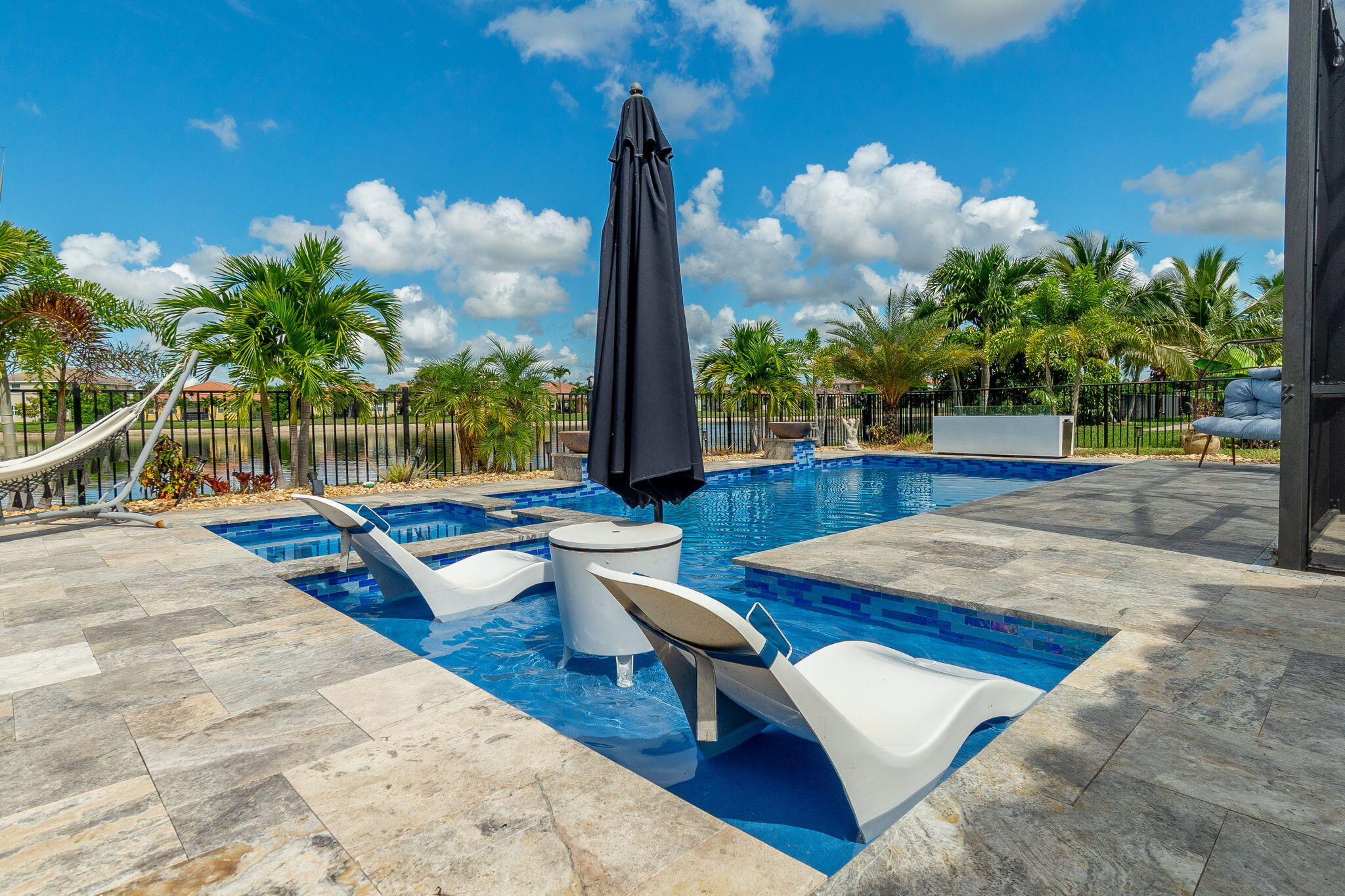 3011 Strada Court Royal Palm Beach, FL 33411 - Photo 2 of 57 a view of a terrace with sitting area