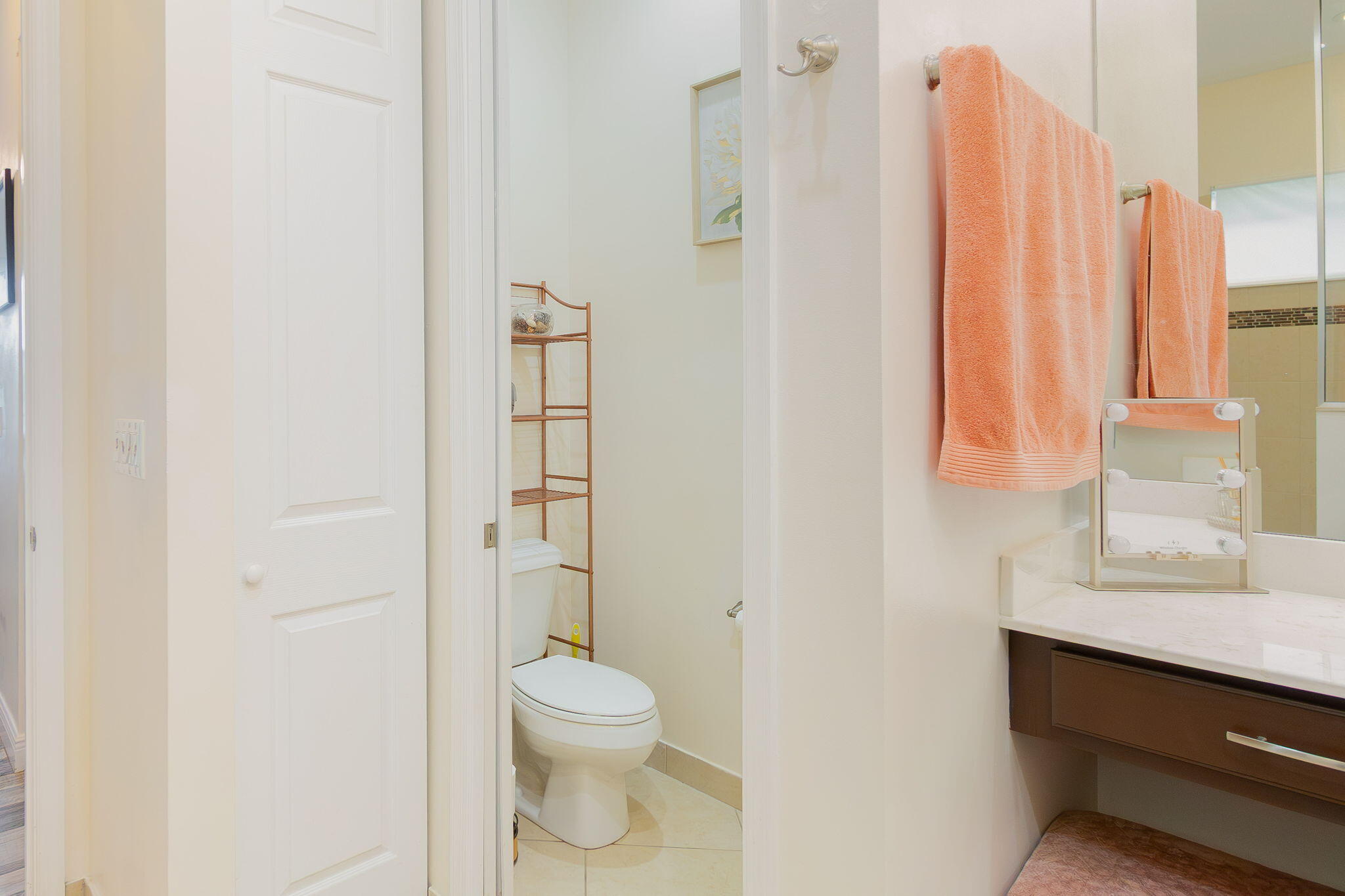 3011 Strada Court Royal Palm Beach, FL 33411 - Photo 26 of 57 a bathroom with a toilet a sink and a window