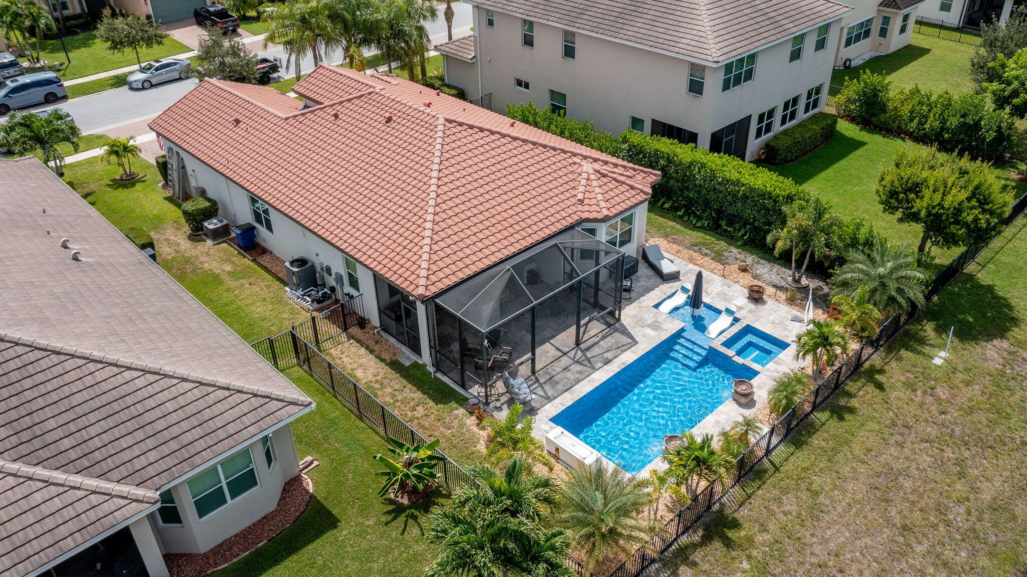 3011 Strada Court Royal Palm Beach, FL 33411 - Photo 46 of 57 an aerial view of a house with a big yard