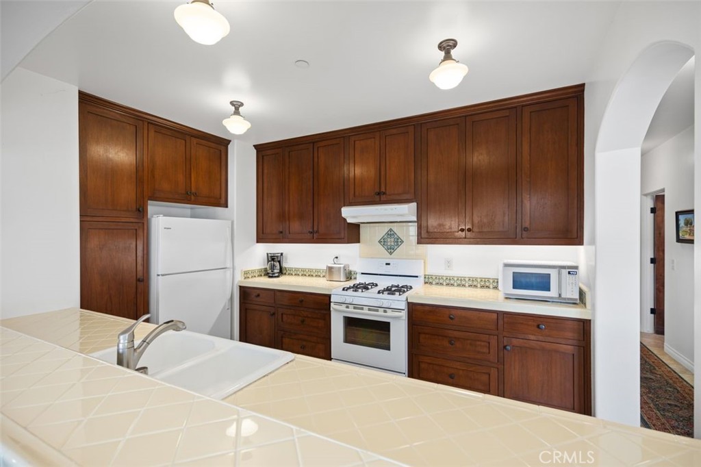 240 Avenida Rosa, Unit B San Clemente, CA 92672 - Photo 16 of 31 Kitchen with beautiful Spanish tiles.