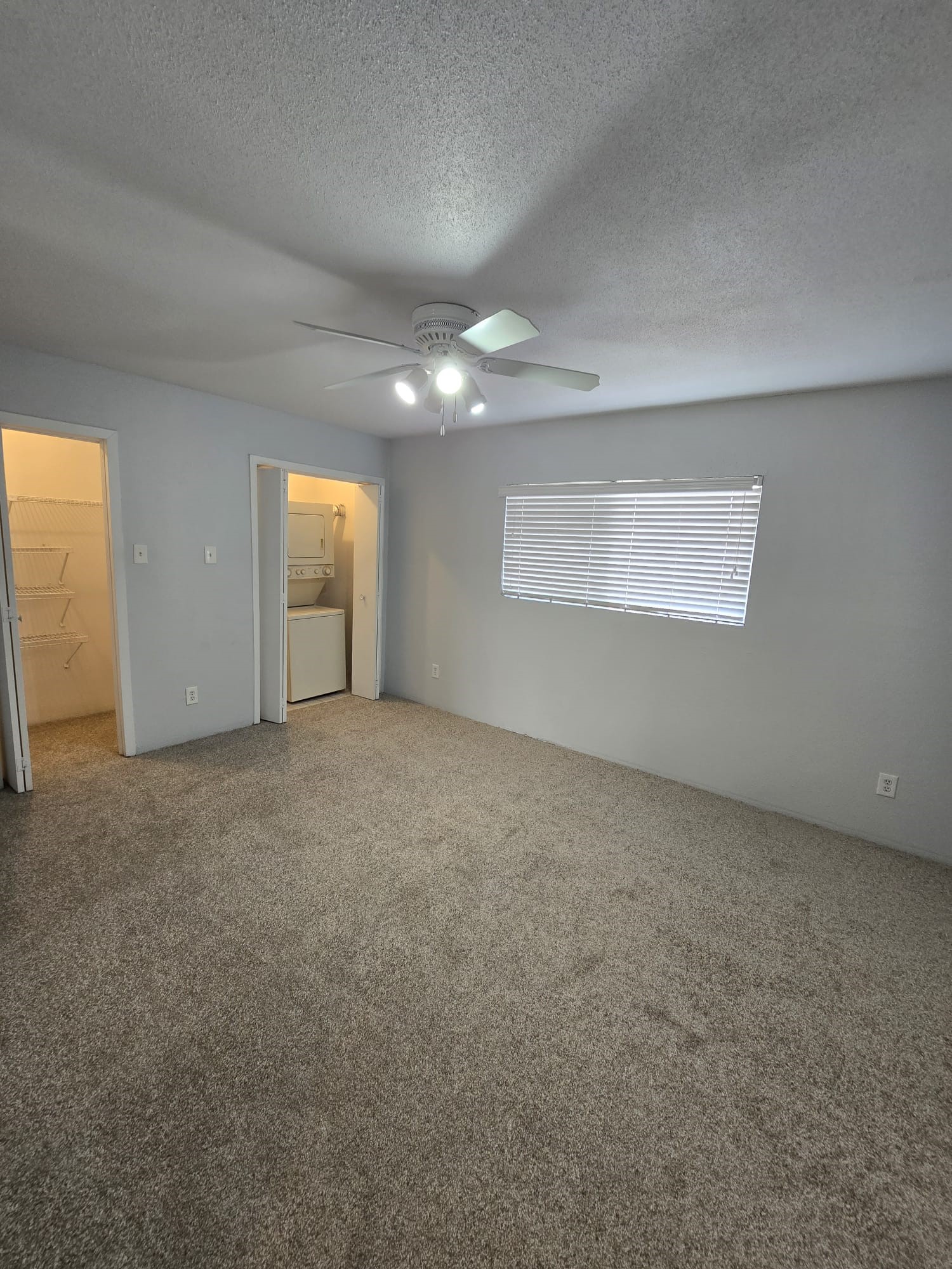 4747 Allendale Road, Unit 50 Houston, TX 77017 - Photo 2 of 9 an empty room with a empty space and windows