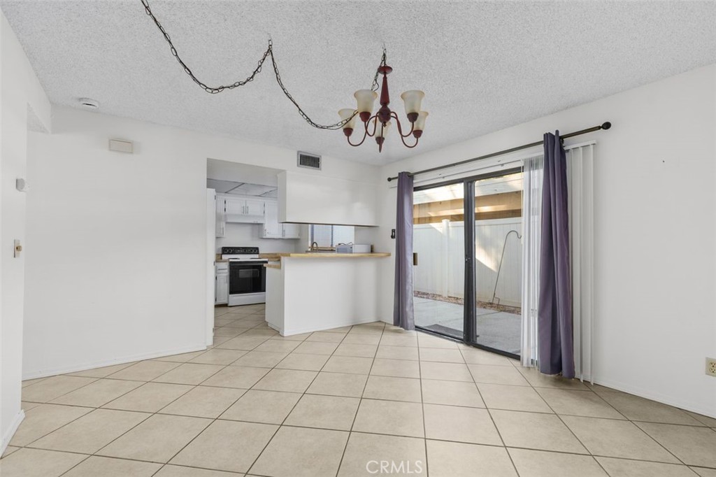 69707 Campana Court Rancho Mirage, CA 92270 - Photo 11 of 47 a view of a kitchen with a sink and cabinets
