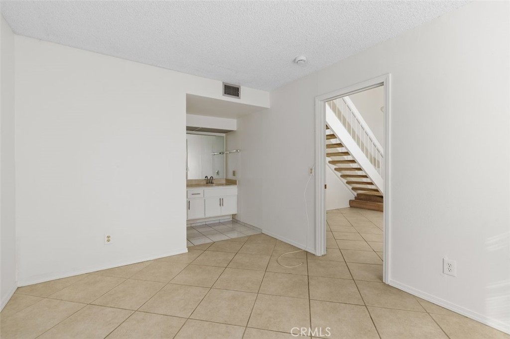 69707 Campana Court Rancho Mirage, CA 92270 - Photo 20 of 47 a view of an empty room with a window