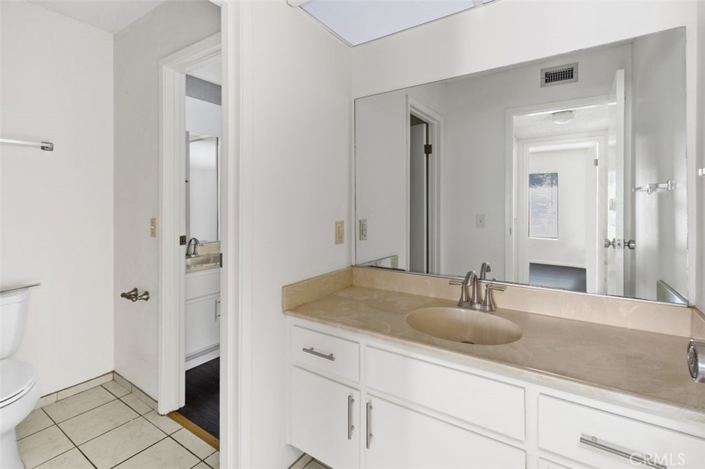 69707 Campana Court Rancho Mirage, CA 92270 - Photo 26 of 47 a bathroom with a sink and a mirror