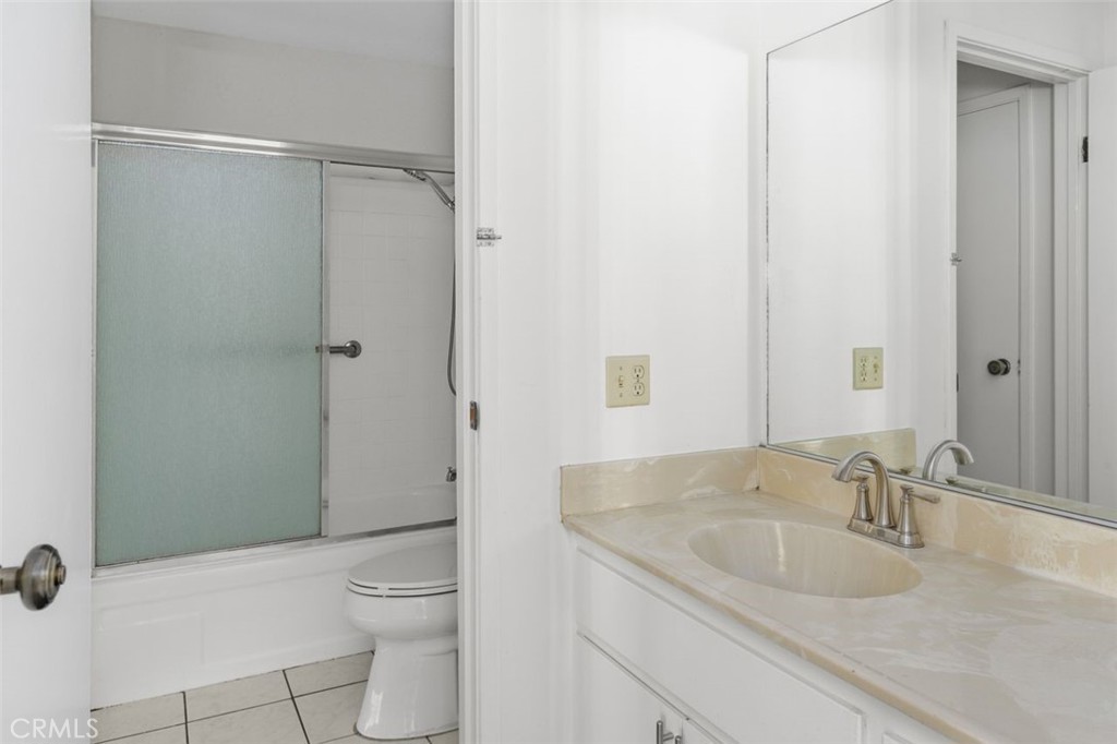 69707 Campana Court Rancho Mirage, CA 92270 - Photo 31 of 47 a bathroom with a granite countertop sink toilet and shower