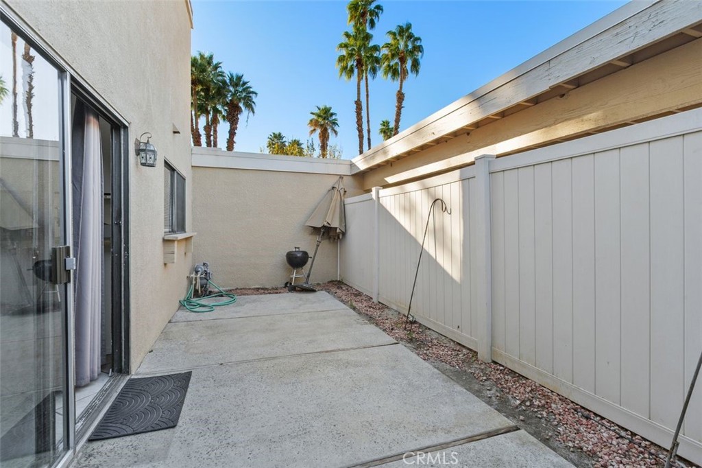 69707 Campana Court Rancho Mirage, CA 92270 - Photo 32 of 47 a view of a house with a backyard