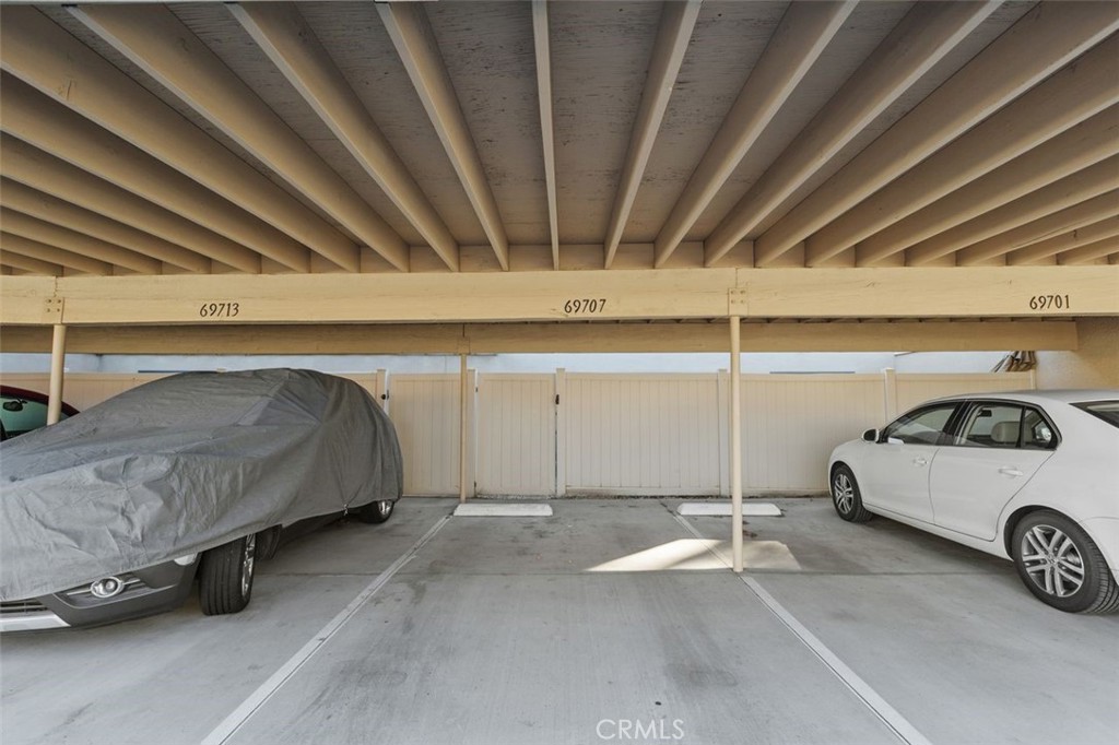 69707 Campana Court Rancho Mirage, CA 92270 - Photo 36 of 47 a car parked in a parking garage