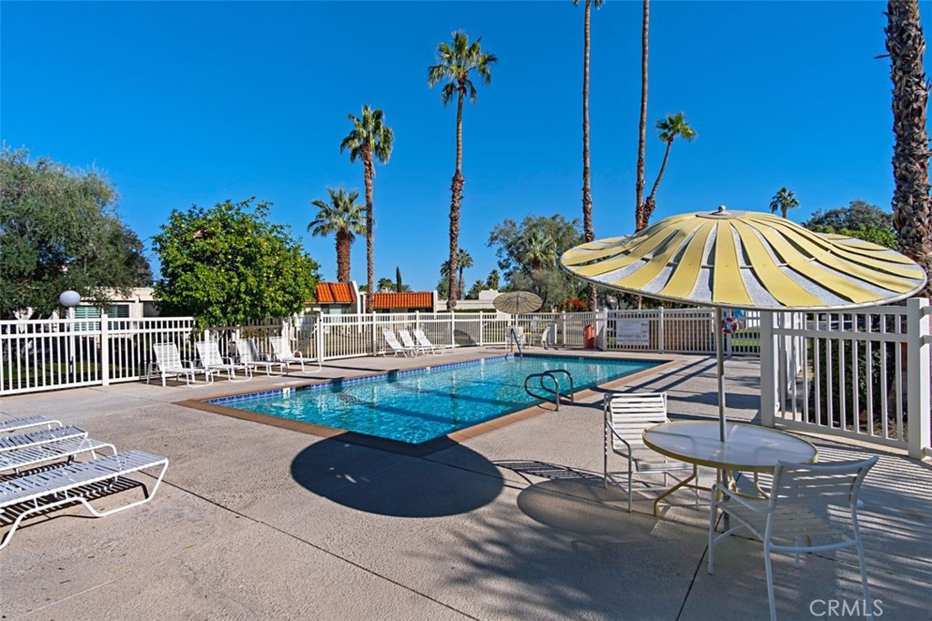 69707 Campana Court Rancho Mirage, CA 92270 - Photo 38 of 47 a view of a chairs and table in backyard