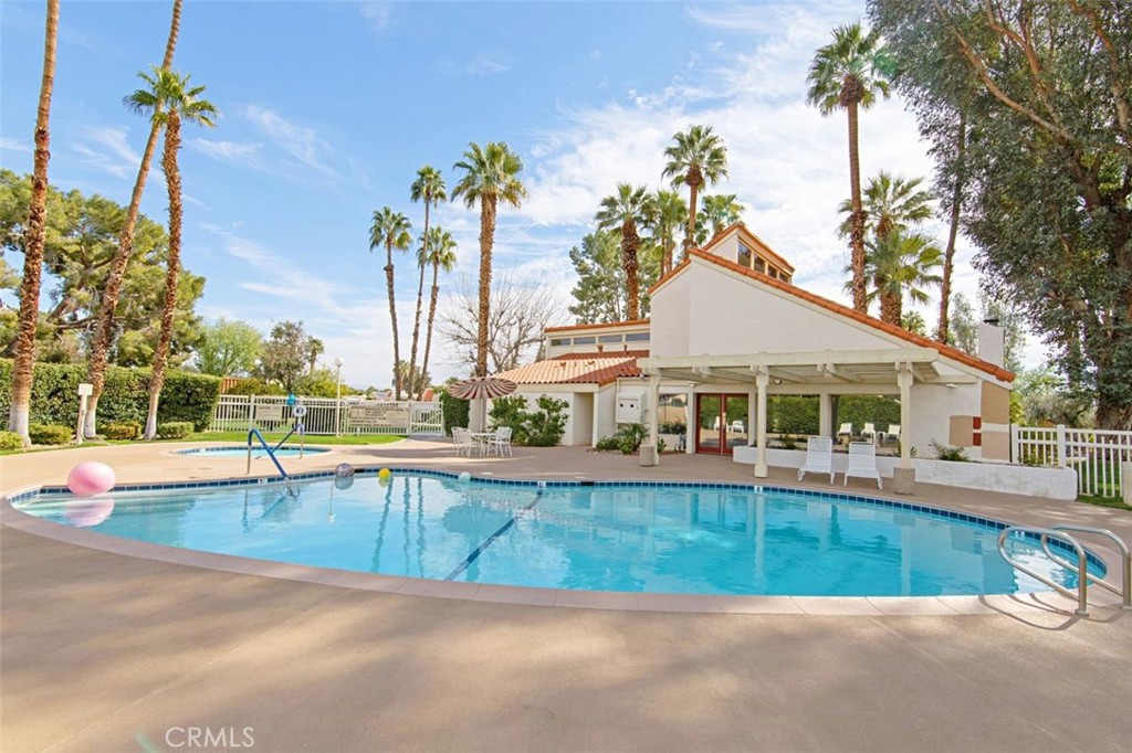 69707 Campana Court Rancho Mirage, CA 92270 - Photo 40 of 47 a view of a house with a swimming pool