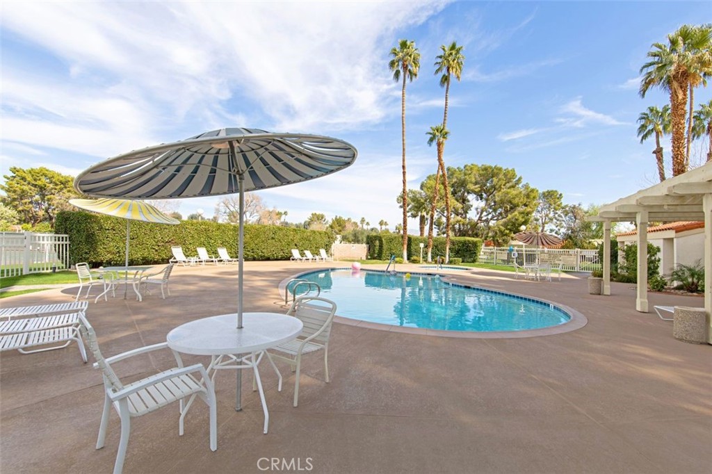 69707 Campana Court Rancho Mirage, CA 92270 - Photo 42 of 47 a view of a swimming pool with a patio
