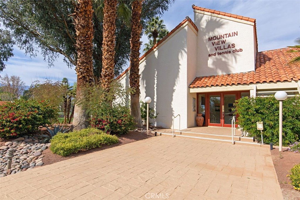 69707 Campana Court Rancho Mirage, CA 92270 - Photo 45 of 47 a view of a building with a tree in front of it