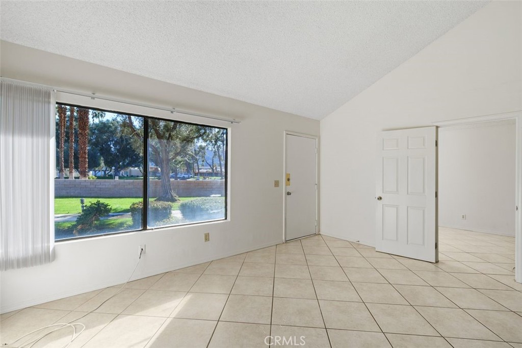 69707 Campana Court Rancho Mirage, CA 92270 - Photo 6 of 47 a view of an empty room with a window