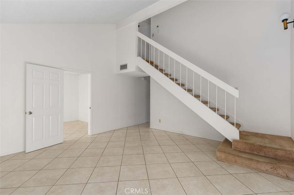 69707 Campana Court Rancho Mirage, CA 92270 - Photo 7 of 47 a view of an entryway with staircase