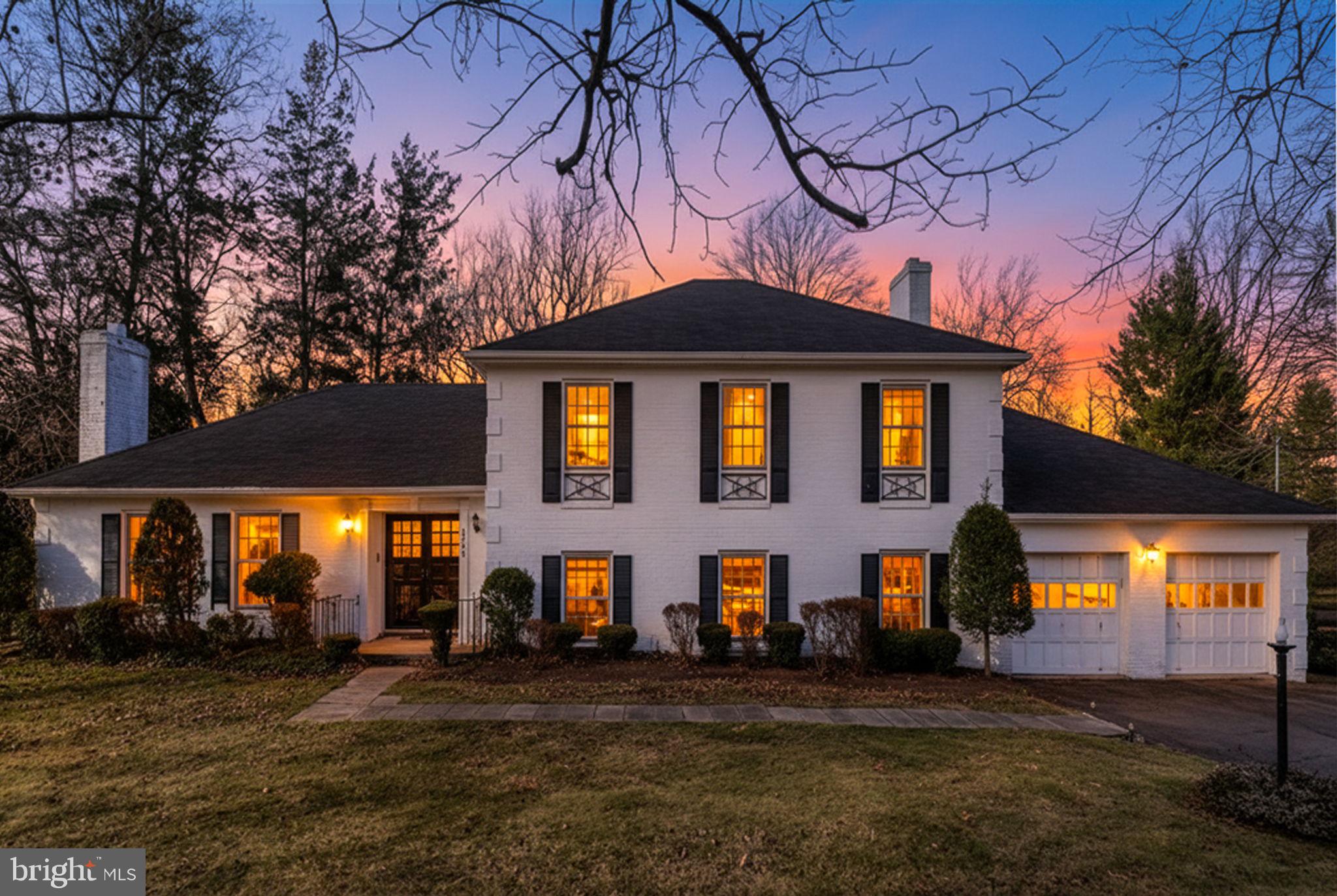 6008 Beech Tree Drive Alexandria, VA 22310 - Photo 2 of 9 a front view of a house with a yard