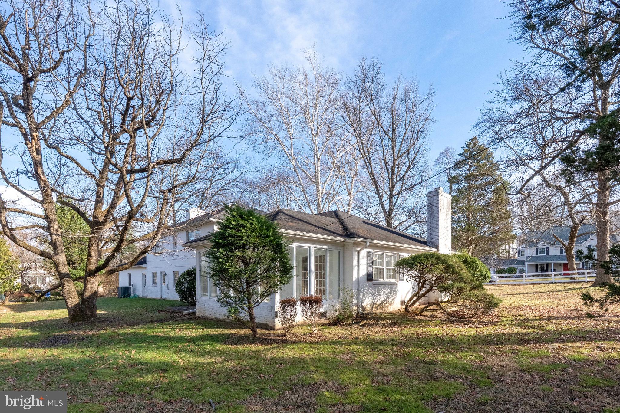 6008 Beech Tree Drive Alexandria, VA 22310 - Photo 7 of 9 a view of a house with a yard