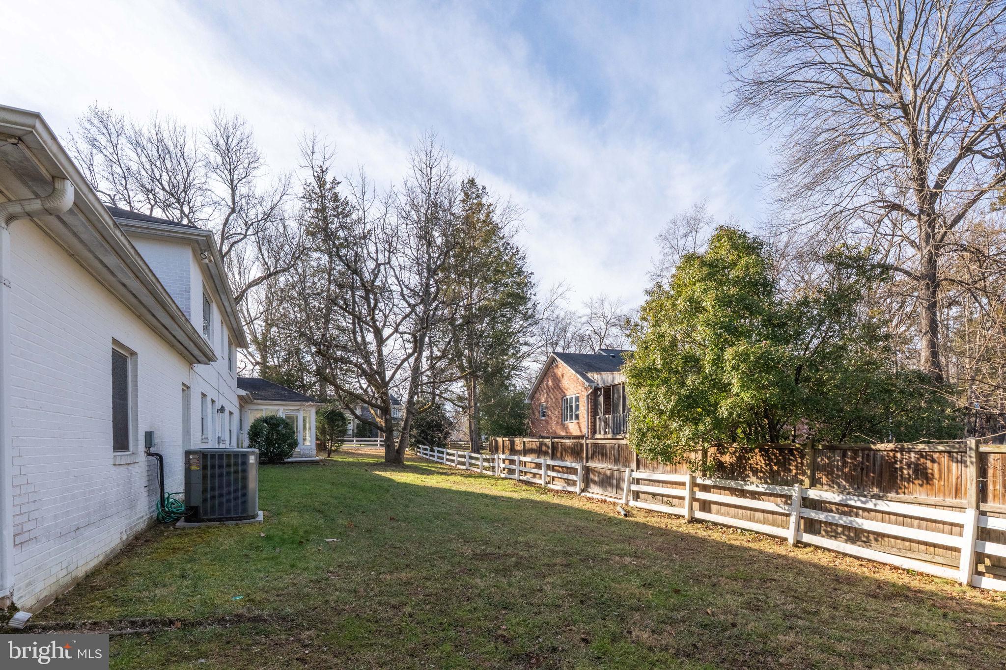 6008 Beech Tree Drive Alexandria, VA 22310 - Photo 9 of 9 a view of a house with a yard