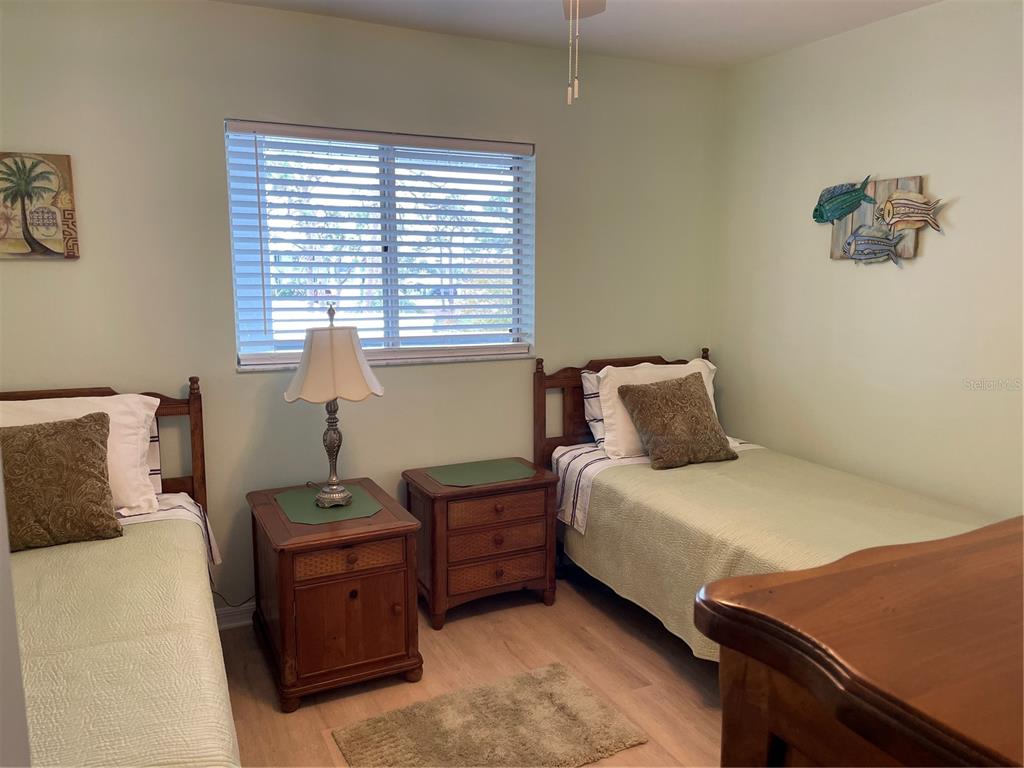 6800 Placida Road, Unit 268 Englewood, FL 34224 - Photo 18 of 33 a bedroom with a bed and a window