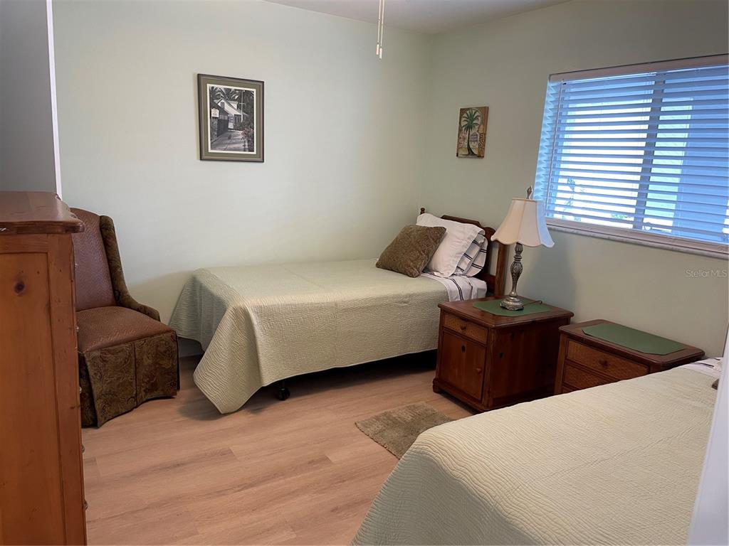 6800 Placida Road, Unit 268 Englewood, FL 34224 - Photo 19 of 33 a bedroom with a bed and a window