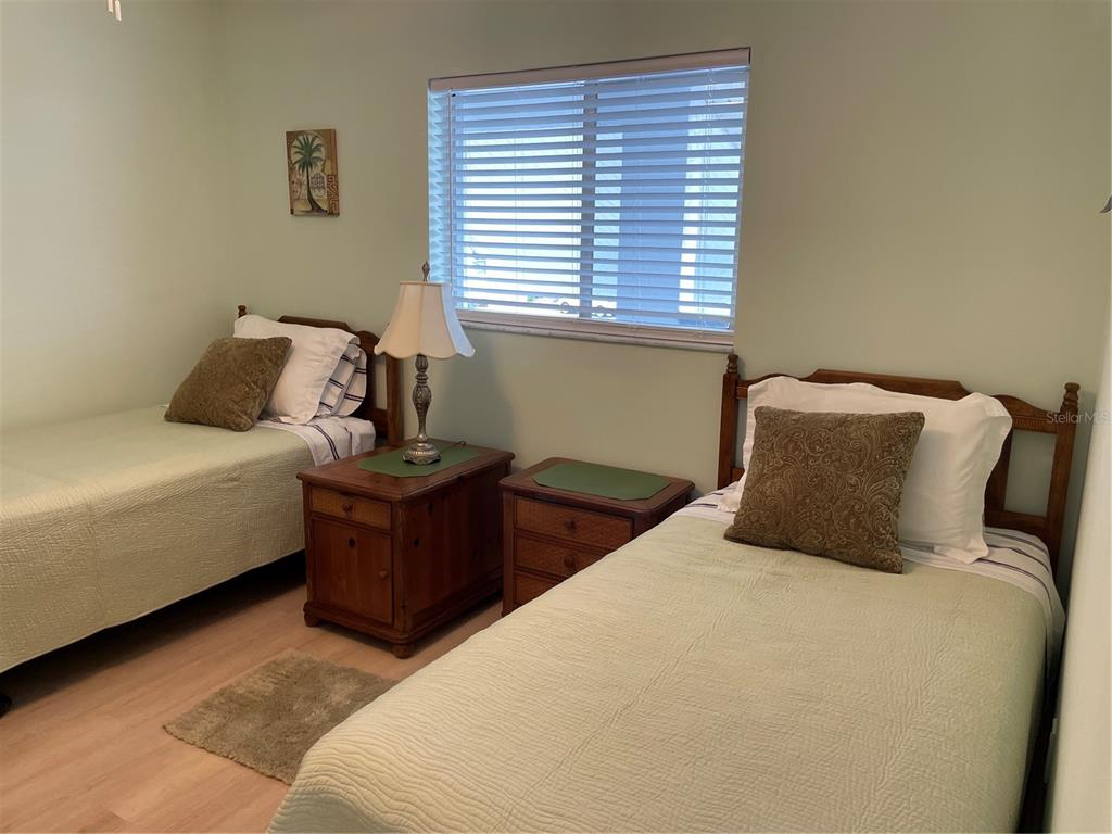 6800 Placida Road, Unit 268 Englewood, FL 34224 - Photo 20 of 33 a bedroom with a bed and window