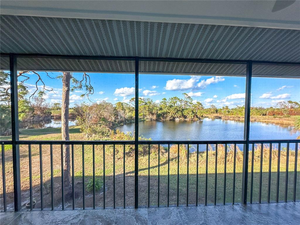 6800 Placida Road, Unit 268 Englewood, FL 34224 - Photo 22 of 33 a view of a back yard from a balcony