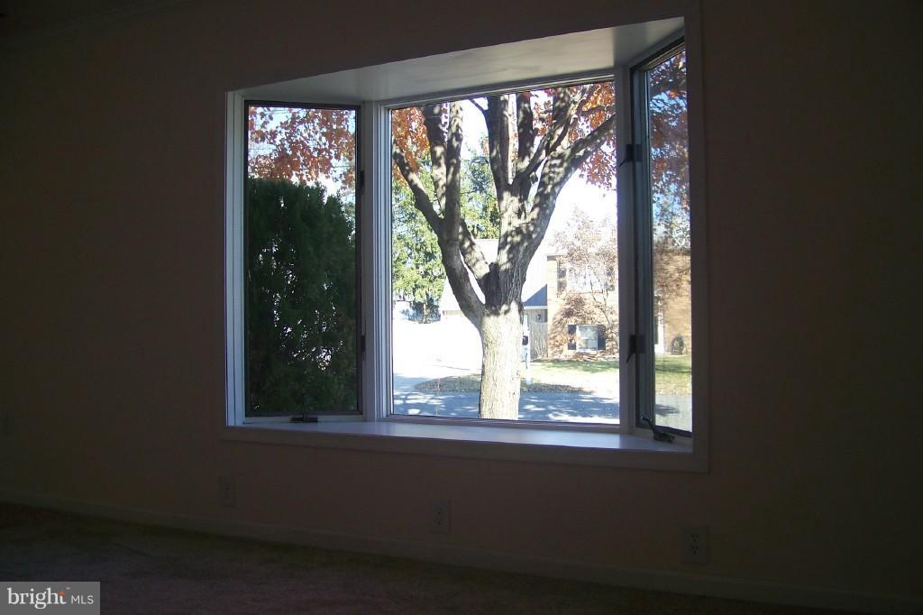 8442 Bedford Road Pasadena, MD 21122 - Photo 12 of 24 Living Room Large Bow Window with View