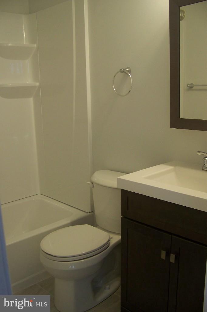 8442 Bedford Road Pasadena, MD 21122 - Photo 21 of 24 Main Bath Upper Bedroom Level