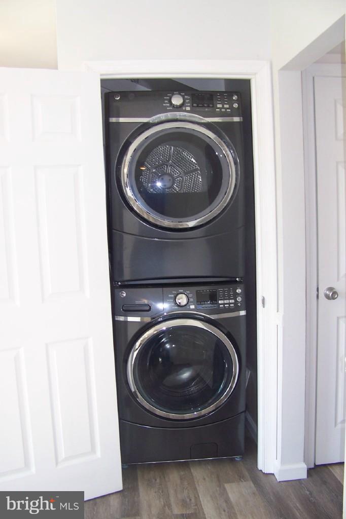 8442 Bedford Road Pasadena, MD 21122 - Photo 22 of 24 New Stacked Washer & Dryer off Kitchen