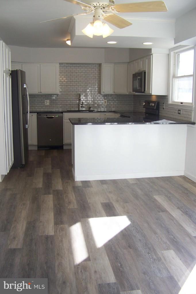 8442 Bedford Road Pasadena, MD 21122 - Photo 5 of 24 Light Filled Country Kitchen w/Dining Area