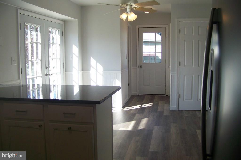 8442 Bedford Road Pasadena, MD 21122 - Photo 6 of 24 Dining Area with New French Doors