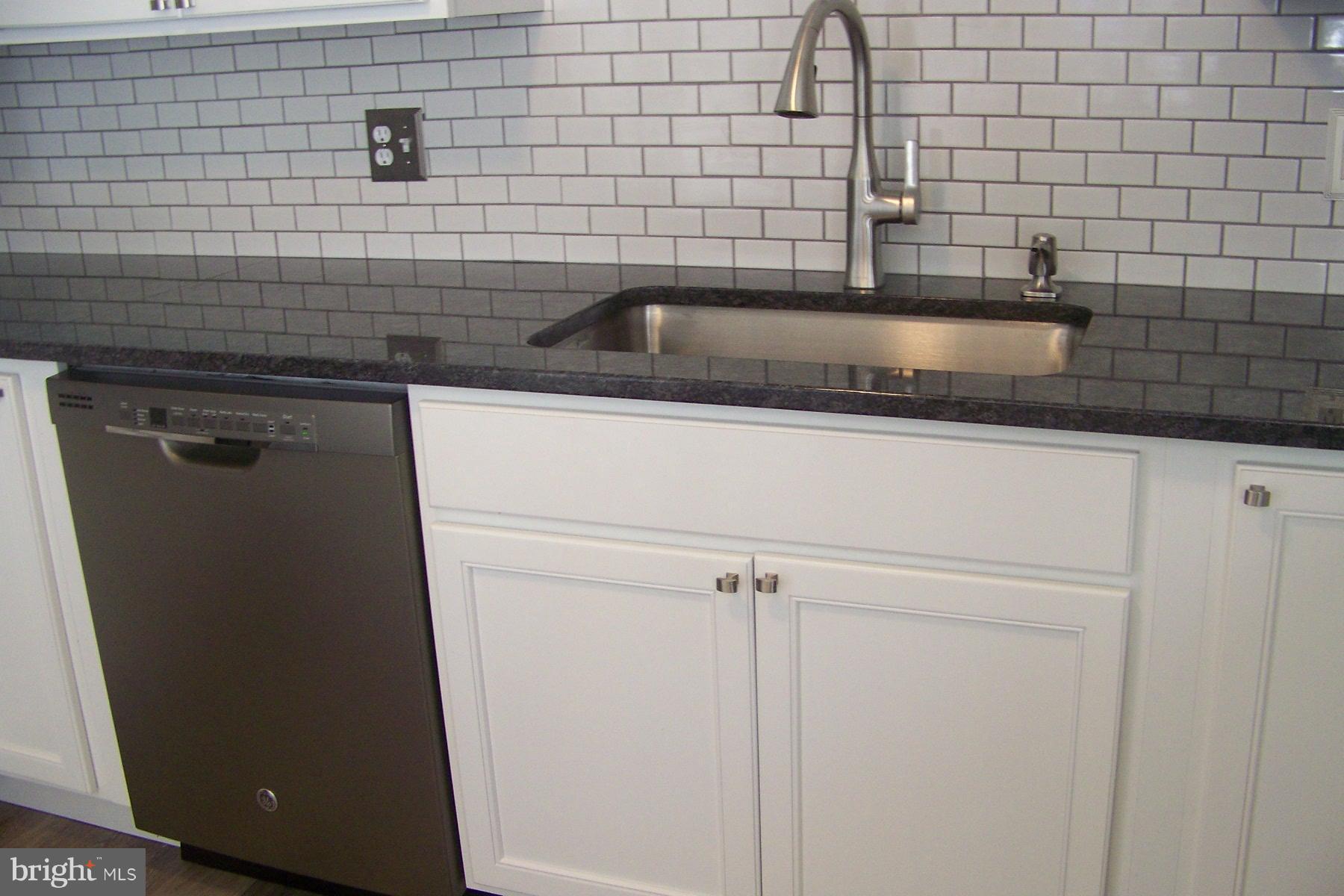 8442 Bedford Road Pasadena, MD 21122 - Photo 8 of 24 Subway Tile Backsplash