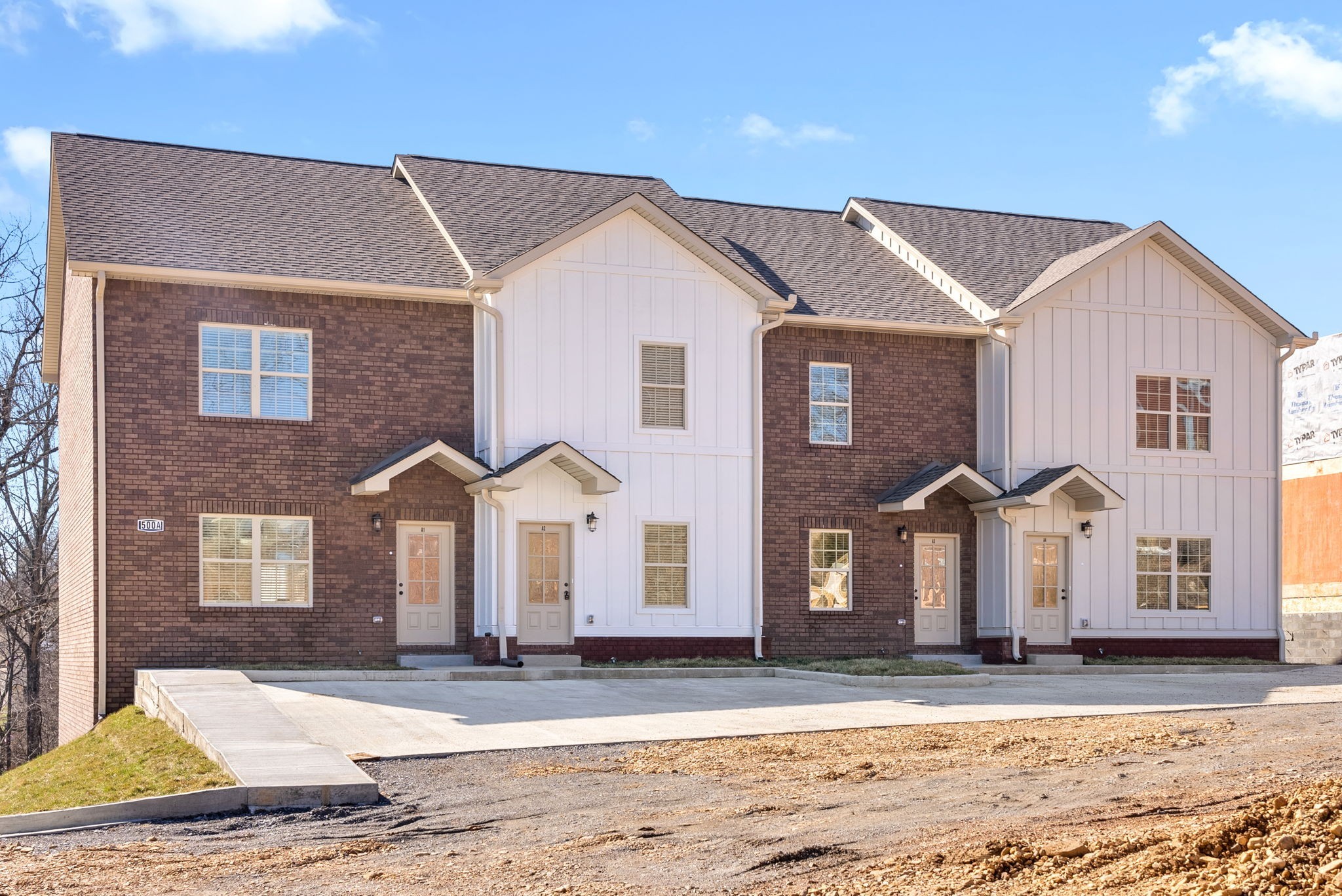 500 Peachers Mill Road, Unit C1 Clarksville, TN 37042 - Photo 1 of 31 a front view of a house with a yard