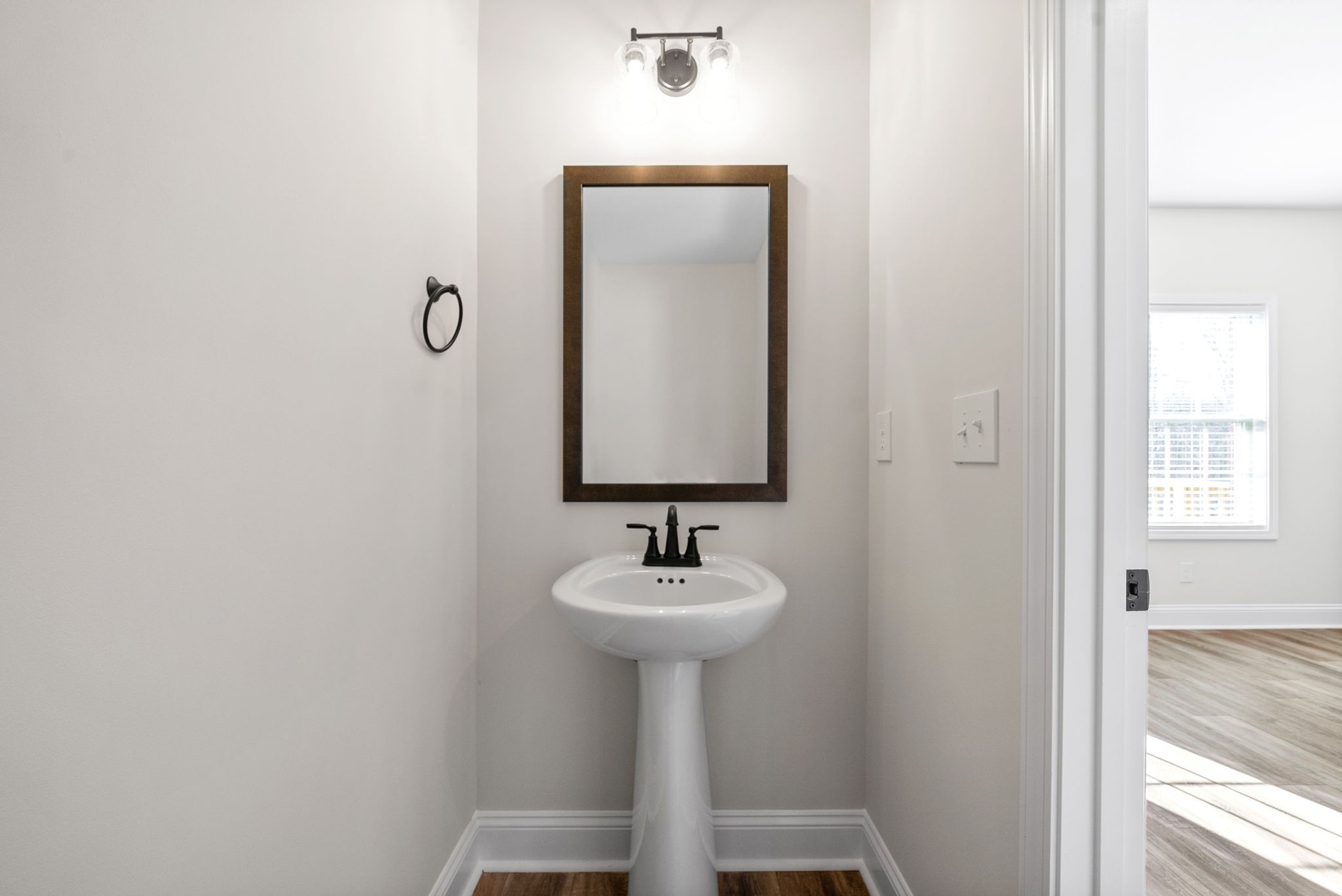 500 Peachers Mill Road, Unit C1 Clarksville, TN 37042 - Photo 11 of 31 a bathroom with a sink and a mirror