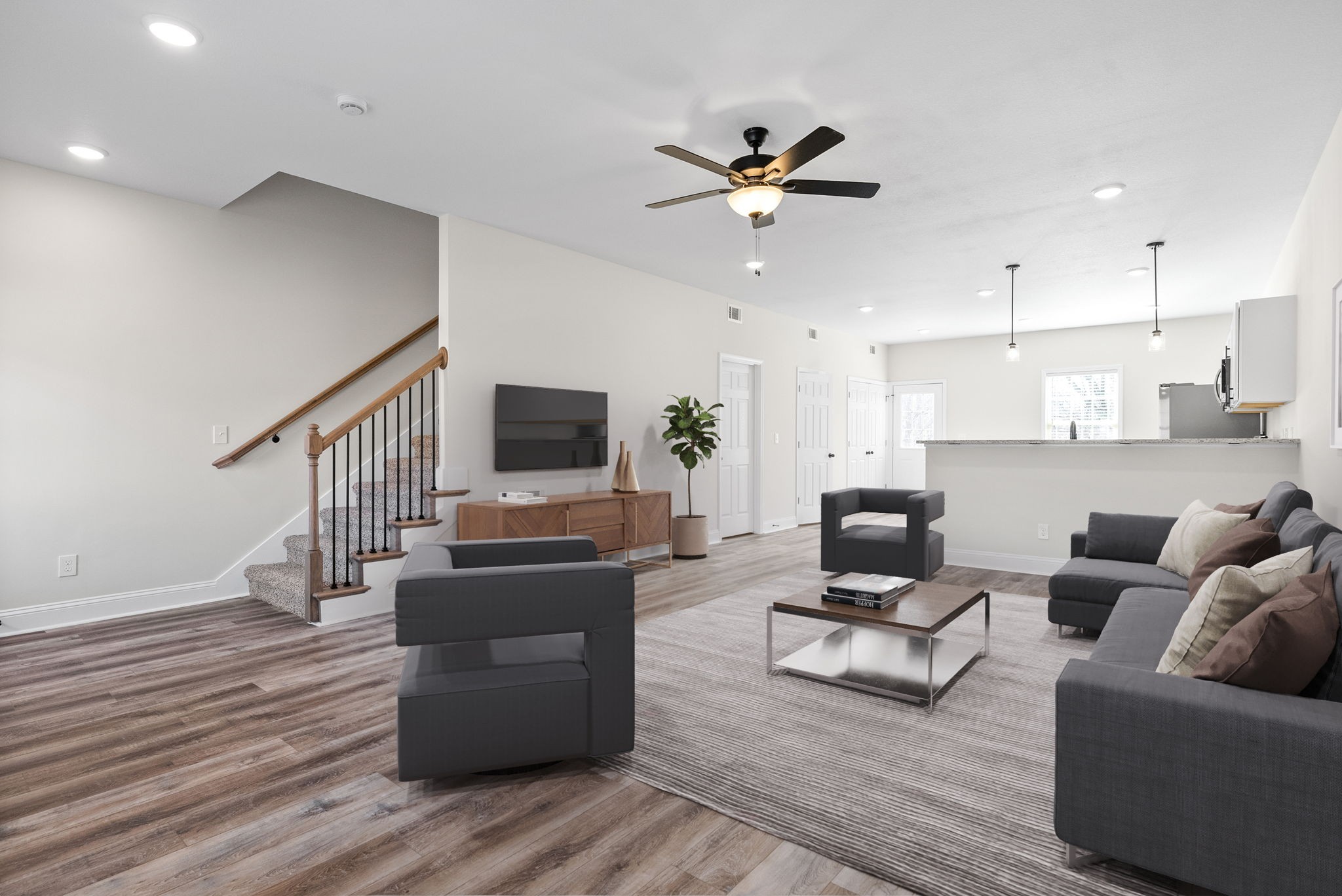 500 Peachers Mill Road, Unit C1 Clarksville, TN 37042 - Photo 30 of 31 a living room with furniture and a wooden floor